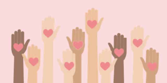 Hands rRaised WIth Hearts On Pink Background | Biotrial
