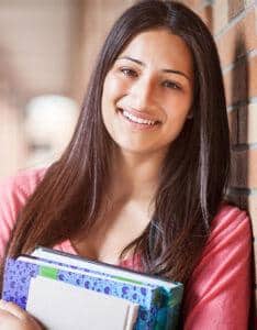 Female Student Along A University Hall Way | Biotrial