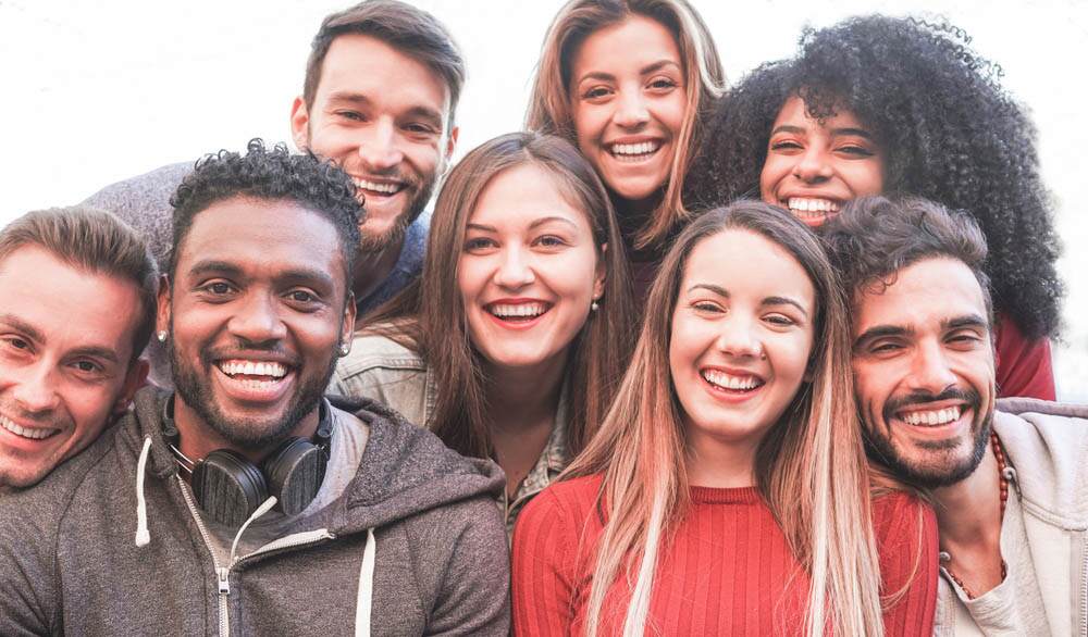 Happy paid clinical trial participants taking a picture together